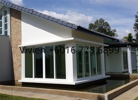 Tidy bungalow with a terrace, near a small beach. Single Storey Bungalow For Sale