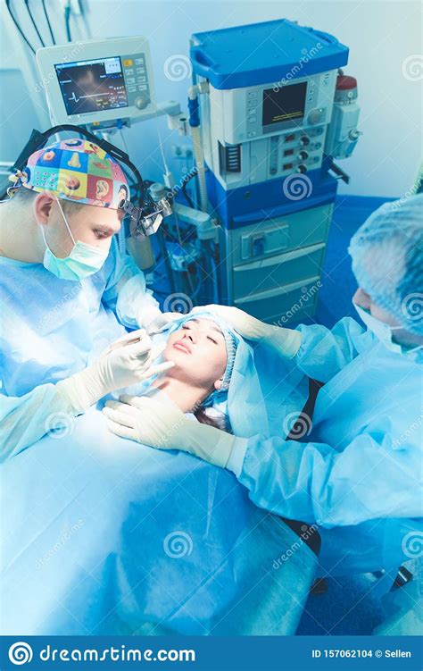 Team Surgeon At Work In Operating Room Stock Photo Image Of Doctor