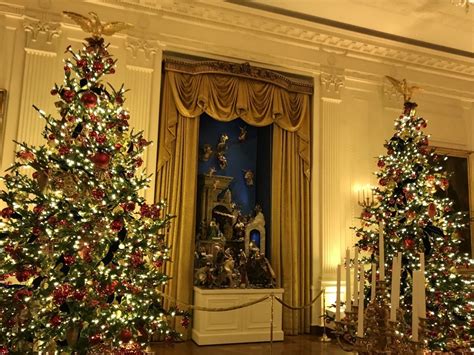 A decorative house of cards sits in the red room, constructed from official white house playing decks. Melania Trump Debuts 'Spirit of America' Christmas Decorations