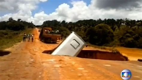 Video Giant Sinkhole Raging Flood Water Swallows Bus In Brazil The