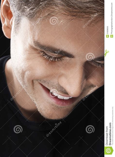 Smiling Young Man Looking Down Stock Photo Image 31838650