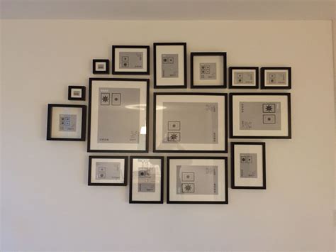 Create a photo wall with frames from Ikea for less than €200. Ask me ...