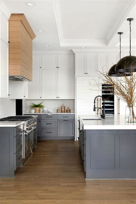 White Upper Cabinets And Dark Gray Lower Cabinets Cottage Kitchen
