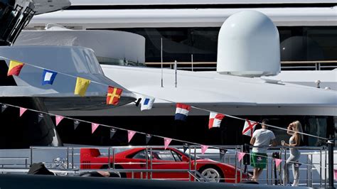 watch a ferrari f40 getting hoisted onto a yacht in monaco is the luxury flex of the day