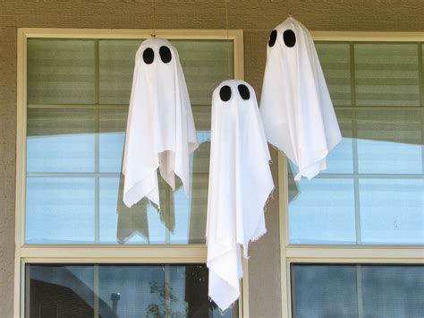 Spooky Hanging Ghosts Revisited Hanging Ghosts Hanging Ghost Decoration Diy Ghost Decoration