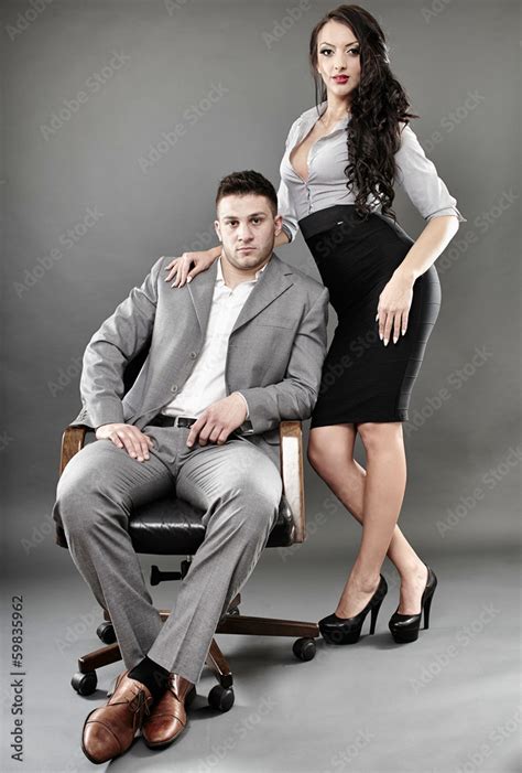 Sexy Secretary And Boss Sitting On A Chair Stock Photo Adobe Stock