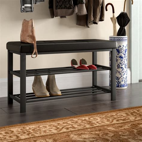 Angled for easy placed in an entryway, this can be a landing area for bags, glasses and phones, while keeping shoes protected until the next trip outside. Winston Porter Kolten Entryway Upholstered Shoe Storage ...