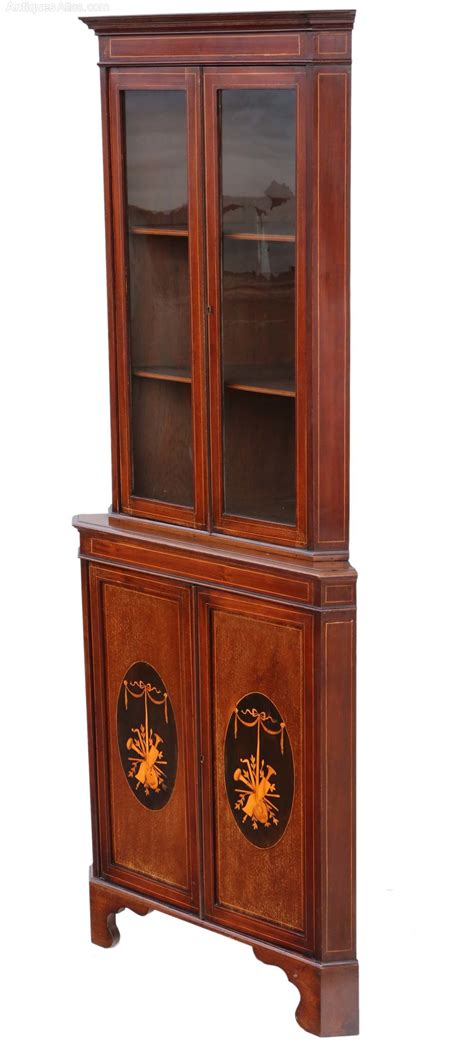 Traditional style corner glass display cabinets with pelmet detail available in light oak, dark oak or mahogany effect. Edwardian Inlaid Mahogany Corner Display Cabinet ...