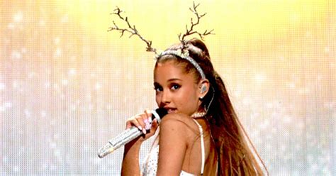 Watch Ariana Grande Almost Trips During New Yorks Jingle Ball E Online