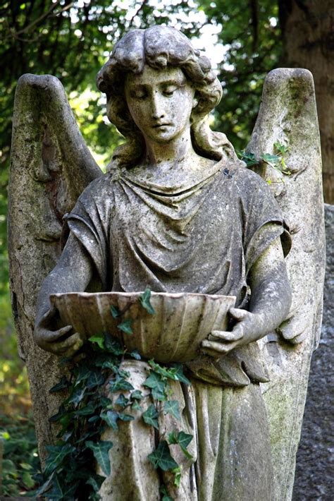 An Angel Atop A Tomb In Highgates East Cemetery Gothic Statue