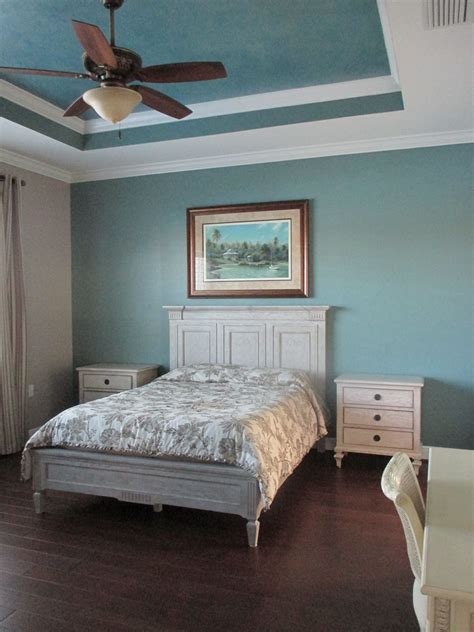 A vaulted ceiling in a great design for a master bedroom. Master retreat. Headboard wall in Sherwin Williams ...