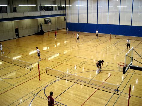 The badminton court dimensions are of 13.4m in length and 6.1m in width. OU Badminton Club