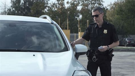Police Officer Stopping Driver Of Vehicle Stock Footage Sbv 318247045 Storyblocks