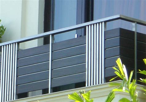 Client specified a modern skylight surround railing for a penthouse roofdeck. Home Wall Decoration: Modern homes Iron grill balcony designs.