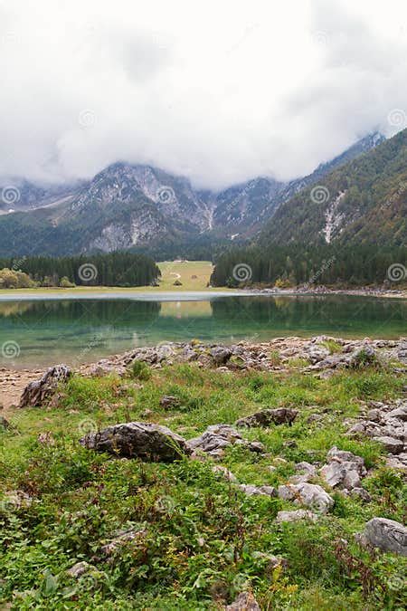Beautiful Lago Di Fusine The Mountain Lake And Mangart Mountain Stock