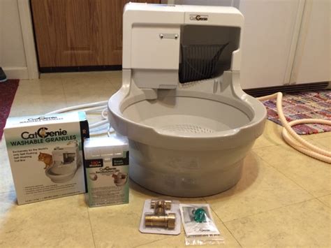 The world's only automatic cat litter box that automatically flushes, washes and dries. Actually Erica: CatGenie 120 Self-Flushing Litterbox Review!
