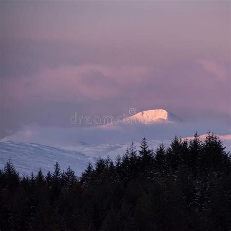 Majestic Alpen Glow Hitting Mountain Peaks In Scottish Highlands During