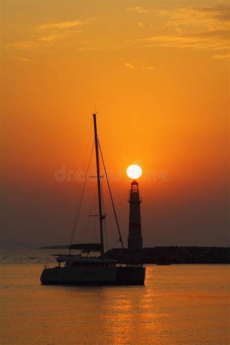 Seascape At Sunset Lighthouse On The Coast Stock Image Image Of