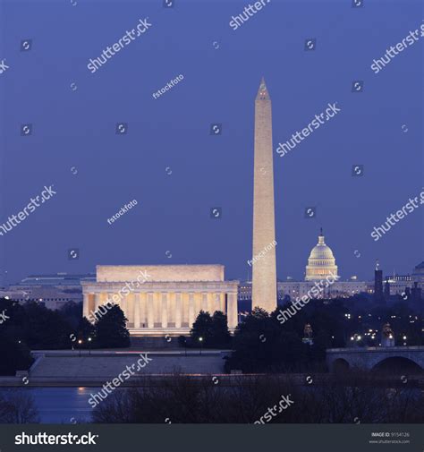 Washington Dc Skyline At Night Showing The Lincoln Memorial