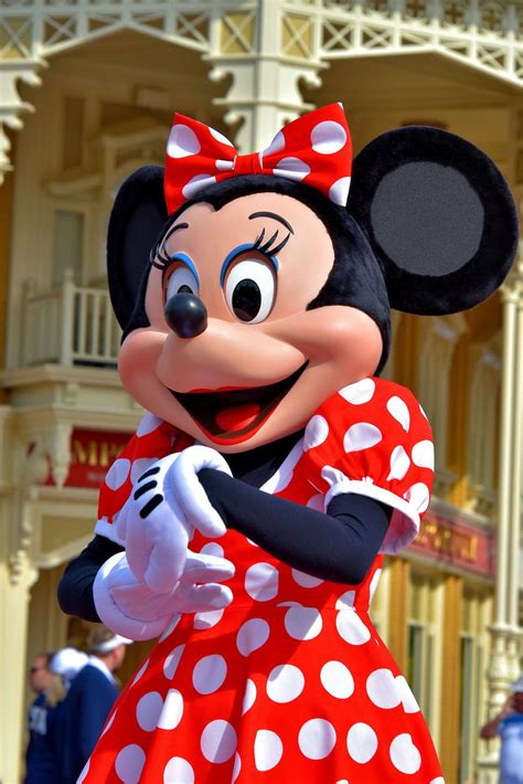 minnie mouse greeting on main street u s a at magic kingdom in orlando florida encircle photos
