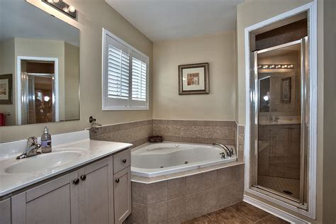 Master Ensuite Features A Jacuzzi Tub And Separate Shower Master