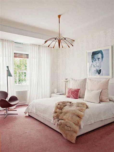 White and pink girls bedroom completed with two pink twin headboards flanking a pink french dresser as a nightstand under a shine wall decor. 10 Perfect Pink Bedrooms - Design*Sponge