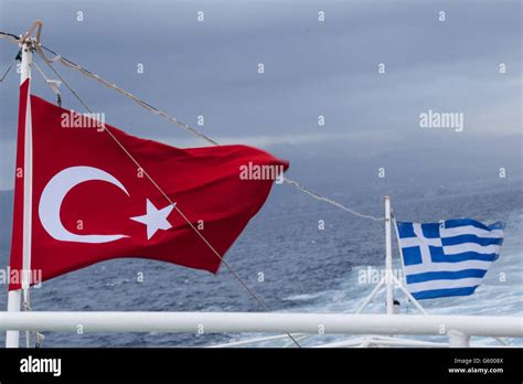 Turkish And Greek Flags With The Sea Stock Photo Alamy