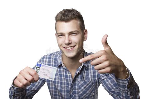 Young Man Showing Off His Driver License Stock Photo Image 34137688