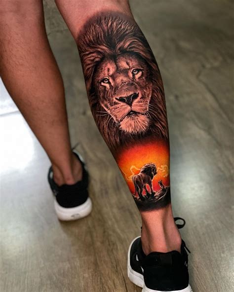 A Man With A Lion Tattoo On His Leg