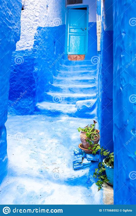 Narrow Street In The Blue City Chefchaouen Morocco Vertical Stock