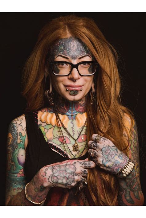 Татуированные девушки с пирсингом 70 фото
