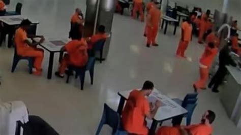 Caught On Camera Prisoner Tries To Strangle A Prison Officer With A