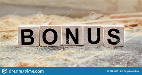 The Word Bonus Is Written On Wooden Cubes Wooden Cubes Lie On The