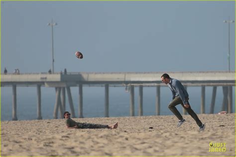 Photo Chris Evans Football On A Many Splintered Thing Set Photo Just Jared