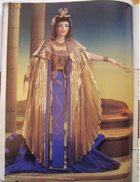 An Open Book With A Photo Of A Woman Dressed In Gold And Blue On Display