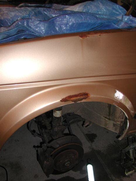 I carefully worked my way around the rust spots and removed paint until i could see clean metal surrounding the rust. How to Fix Rust Spots on a Car | DIYIdeaCenter.com
