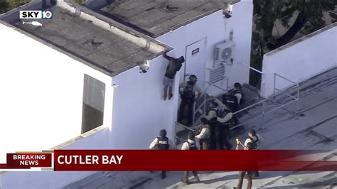 Officers Surround Cutler Bay Building After Intruder Jumps On Roof