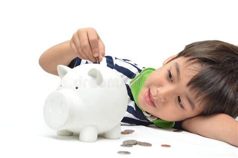 Little Boy Saving Money In Piggy Bank Stock Photo Image Of Full