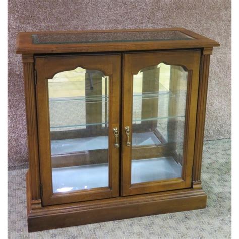 I only have one issue with it, even in daylight, it's dark inside. 1970s Traditional Lighted Two Door Curio Console Cabinet ...
