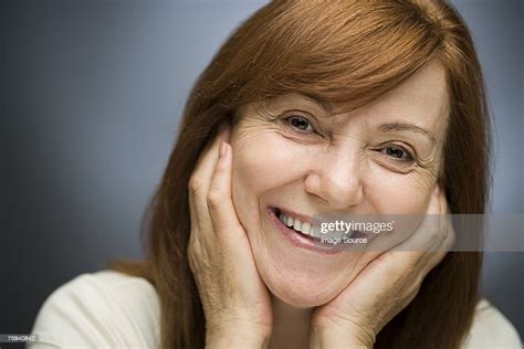 Smiling Mature Woman High Res Stock Photo Getty Images