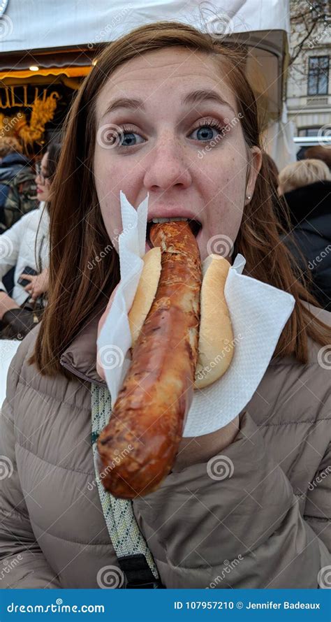 Girl Eating A Bratwurst Sausage Stock Photo Image Of Christmas