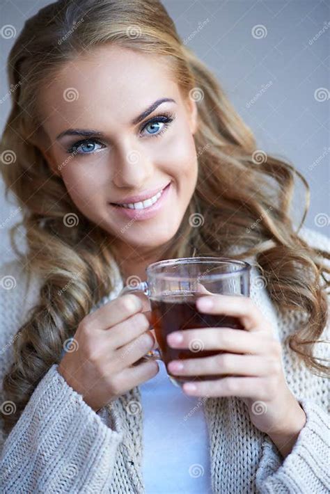 Closeup Of A Pretty Woman Holding A Cup Of Tea Stock Photo Image Of