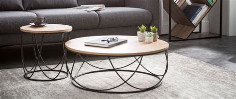 Portez votre choix sur cette table ronde blanche excellens de bruneau ! Table basse bois et métal noir ronde 80 cm LACE - Miliboo