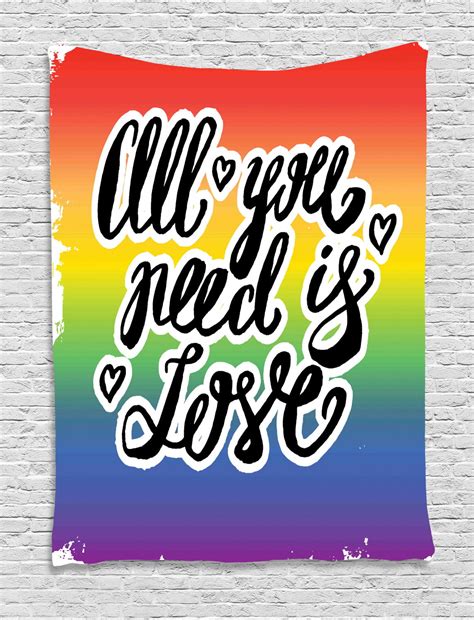 all you need is love tapestry gay pride slogan with hand written lettering on rainbow spectrum