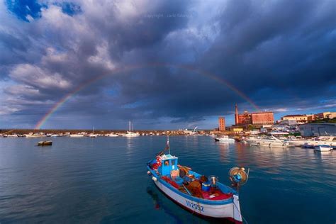 Qui puoi parlare in italiano. Torre del Greco, spunta un arcobaleno sul porto - la ...