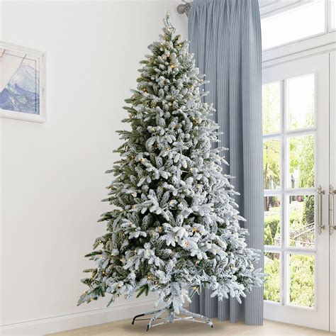 75ft Artificial Snow Flocked Christmas Tree With White Realistic Tips