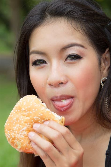 Girl Eating A Cheeseburger Stock Image Image Of Hungry 33556159