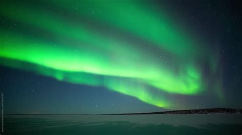 Northern Lights Creates A Display Of Light And Color On The Starry Sky