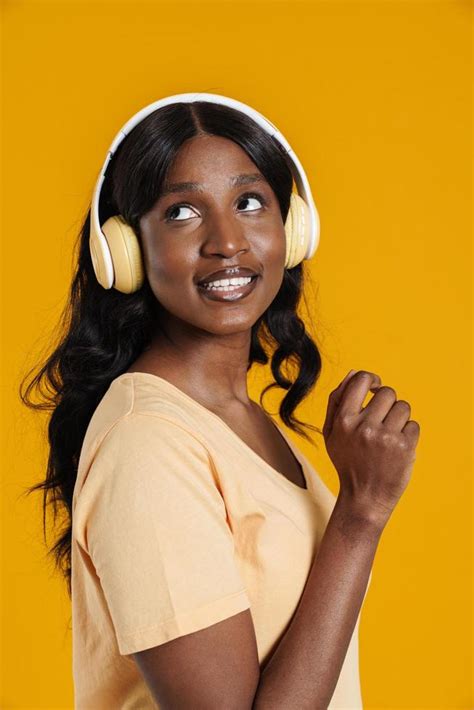 Happy African Woman Listening To Music With Headphones 5179762 Stock