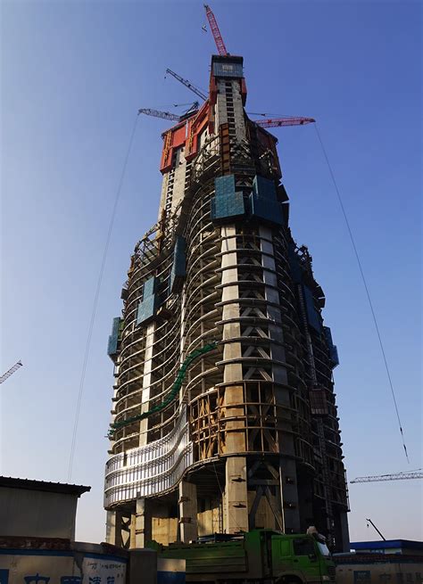 Another chinese building, ping an finance center, was also scaled down for similar reasons. Photos: Wuhan Greenland Center Brings China to New Heights ...